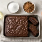 Brownie assado ao centro com comparações entre manteiga e óleo, açúcar branco e mascavo, ovos e gel de linhaça.