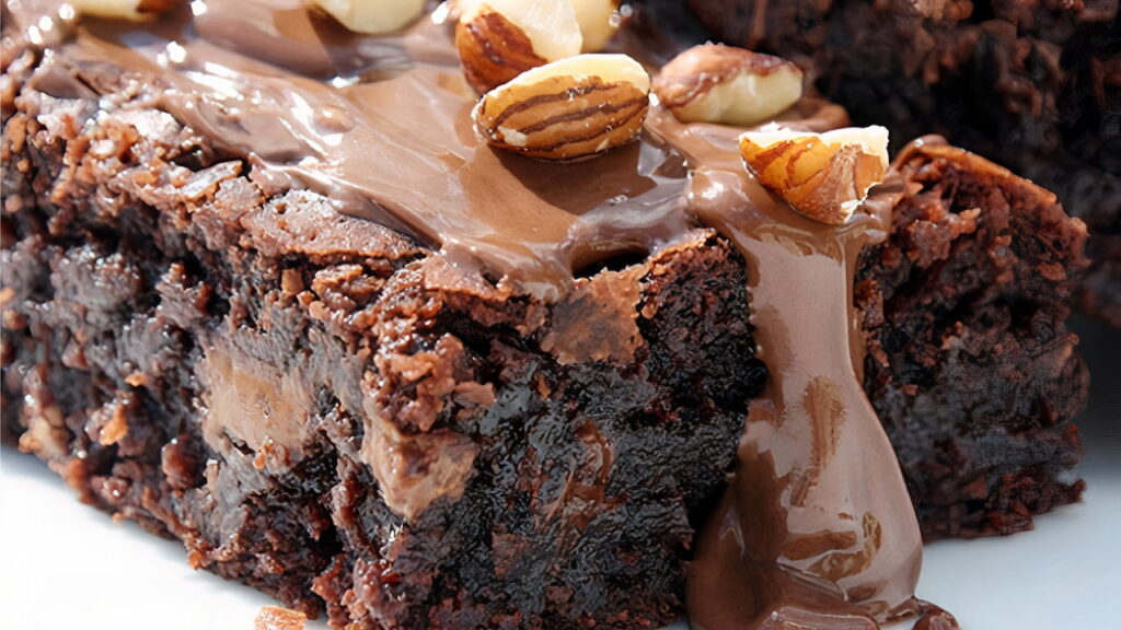 foto de um brownie de nutella com avelãs por cima